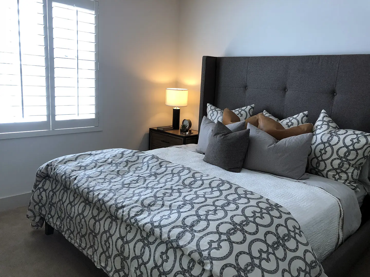 Basement Bedroom with a large bed