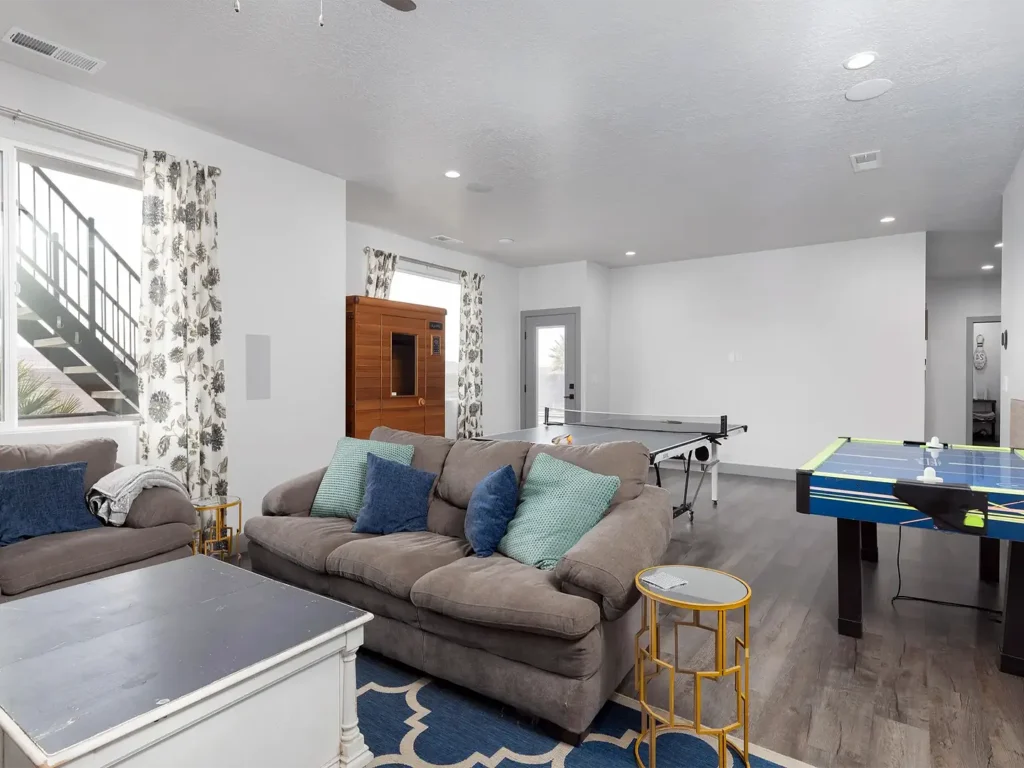 Basement Finishing Utah- basement family room with a walk-out entrance