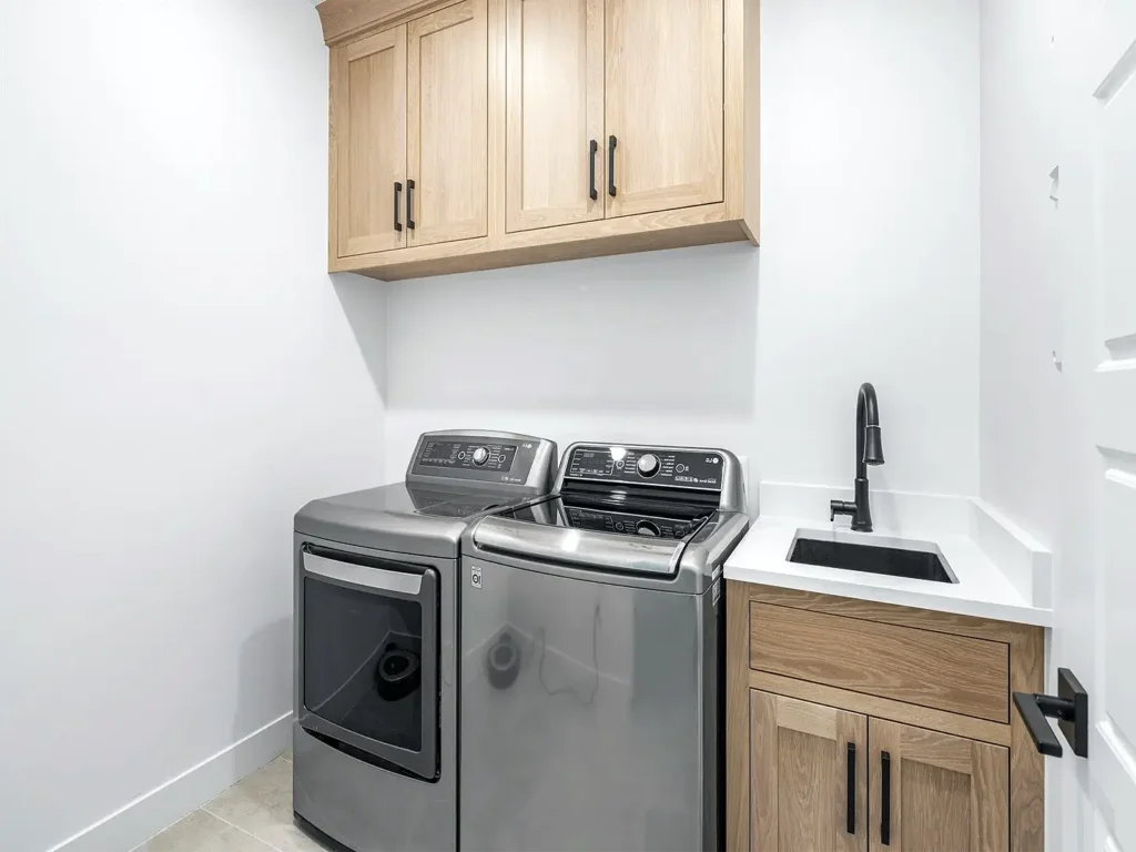 Basement Finishing Utah with a small laundry room