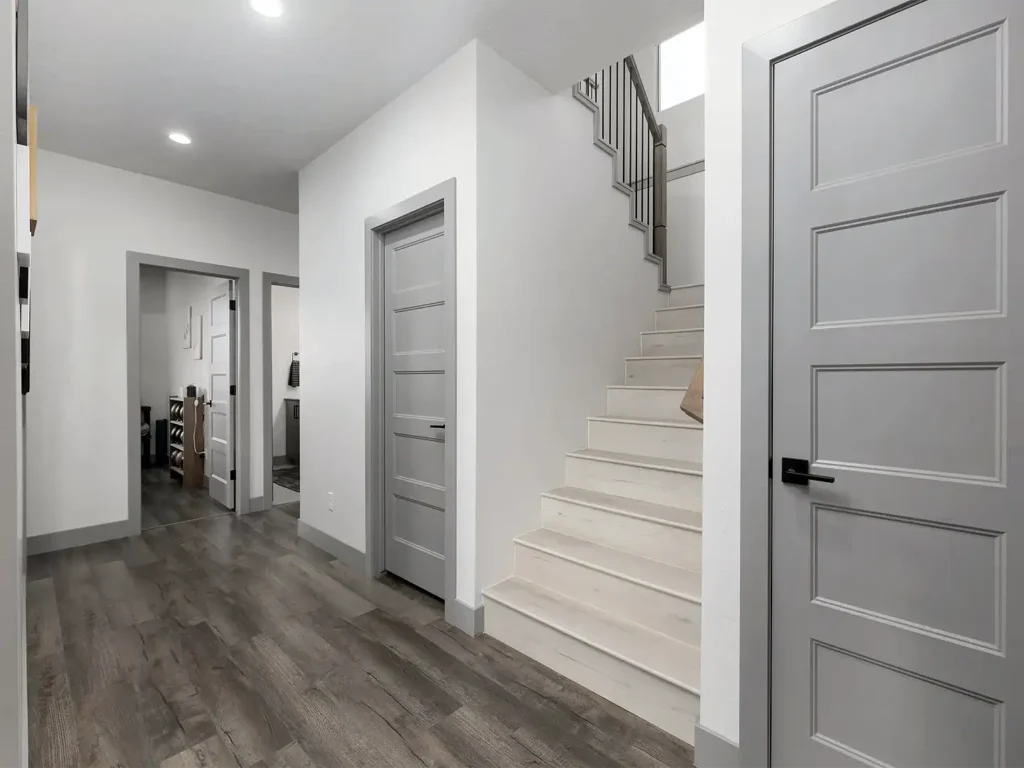 Basement Finishing Utah- basement stairs finished with LVP caps