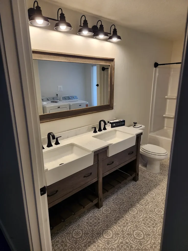 Basement Bathroom with double sinks