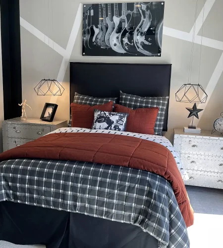 basement bedroom with bed nightstands and modern decor
