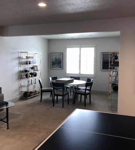 Basement Finishing Utah- a large family room with a ping pong table