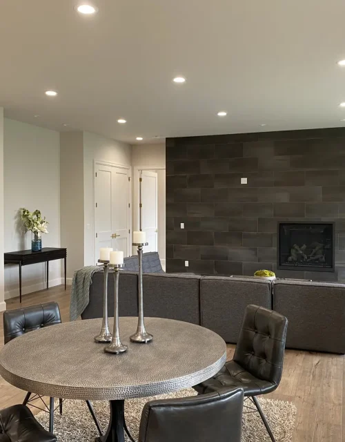 Utah Basement Finishing- family room with a fireplace