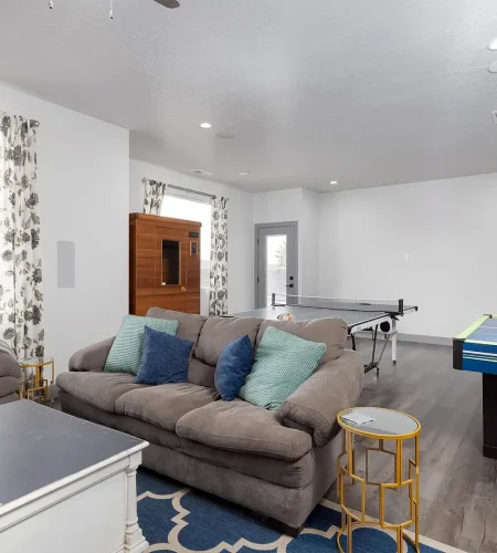 Basement Finishing Utah- basement family room with a walk-out entrance