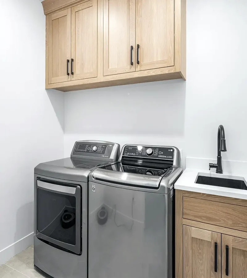 Basement Finishing Utah with a small laundry room