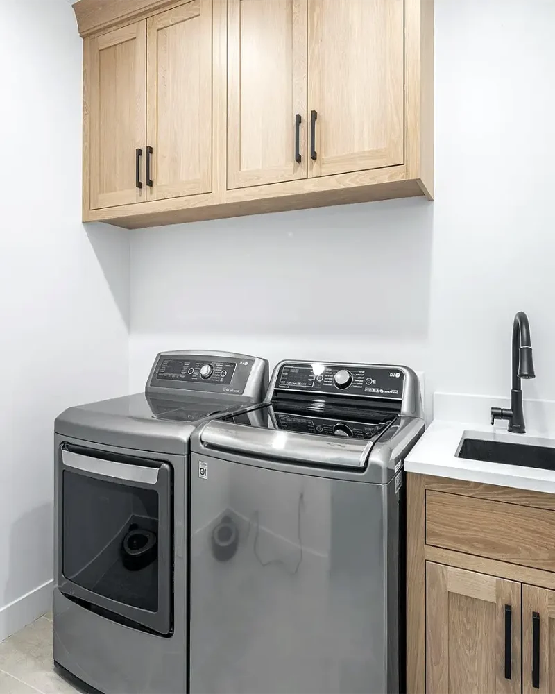 Basement Finishing Utah with a small laundry room