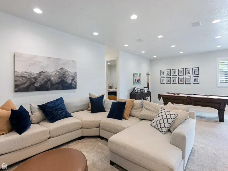 Utah Basement Finishing- family room with a large couch