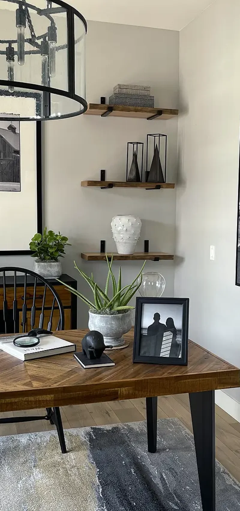 basement home office with desk shelving and built-in storage