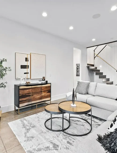 Basement Finishing Layton Utah- modern basement family room in white with black trim