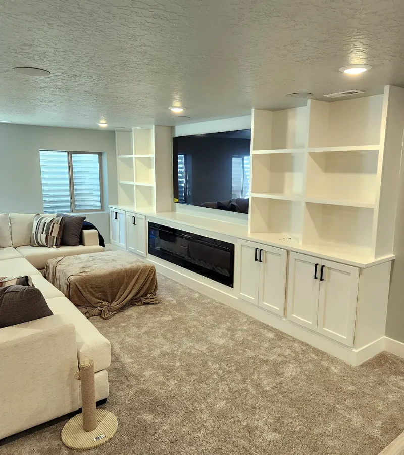 Basement Finishing Utah- family room with custom cabinets