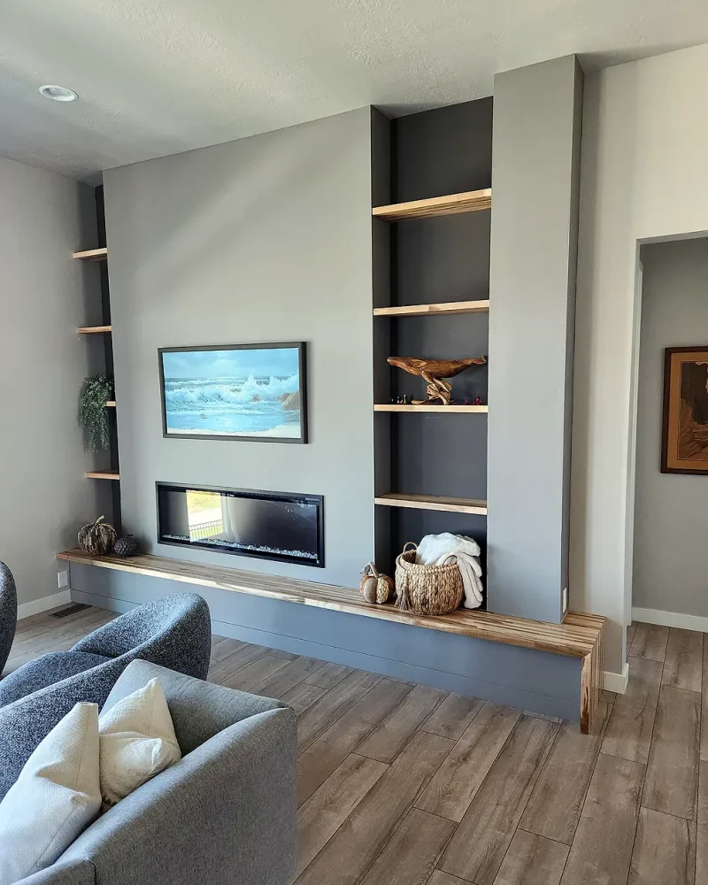 Basement Finishing Utah- custom fireplace with built in shelving