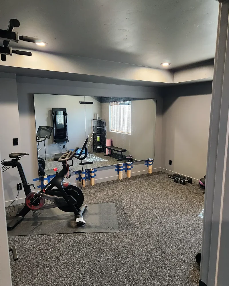 Basement Finishing Utah- simple home gym with full mirrors