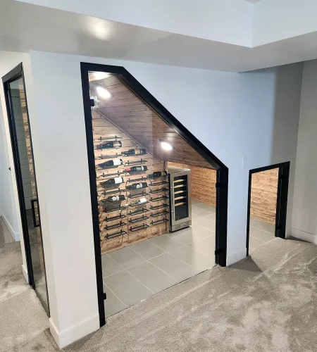 Basement Finishing Utah- basement wine room with custom glass panels