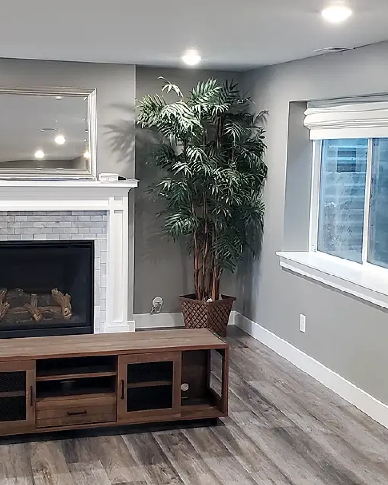 Salt Lake City Basement Finishing- basement family room with a fireplace and a nice mantel