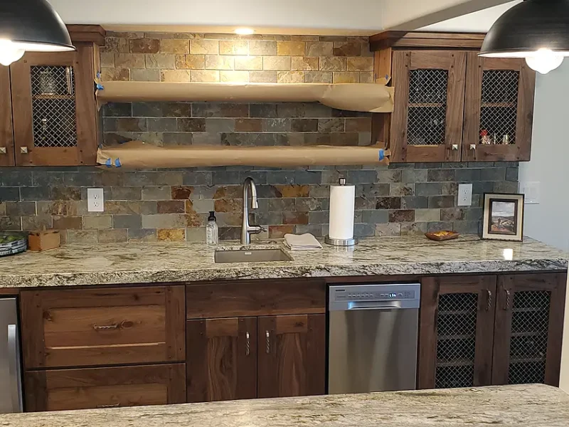 Basement Finishing Utah- a basement kitchen with granite countertops