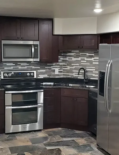 Basement Apartment ADU- nice kitchen with dark cabinets