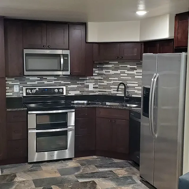 Basement Apartment ADU- nice kitchen with dark cabinets