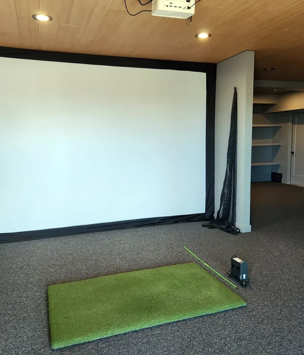 Basement Finishing Utah- basement remodel to add a golf simulator